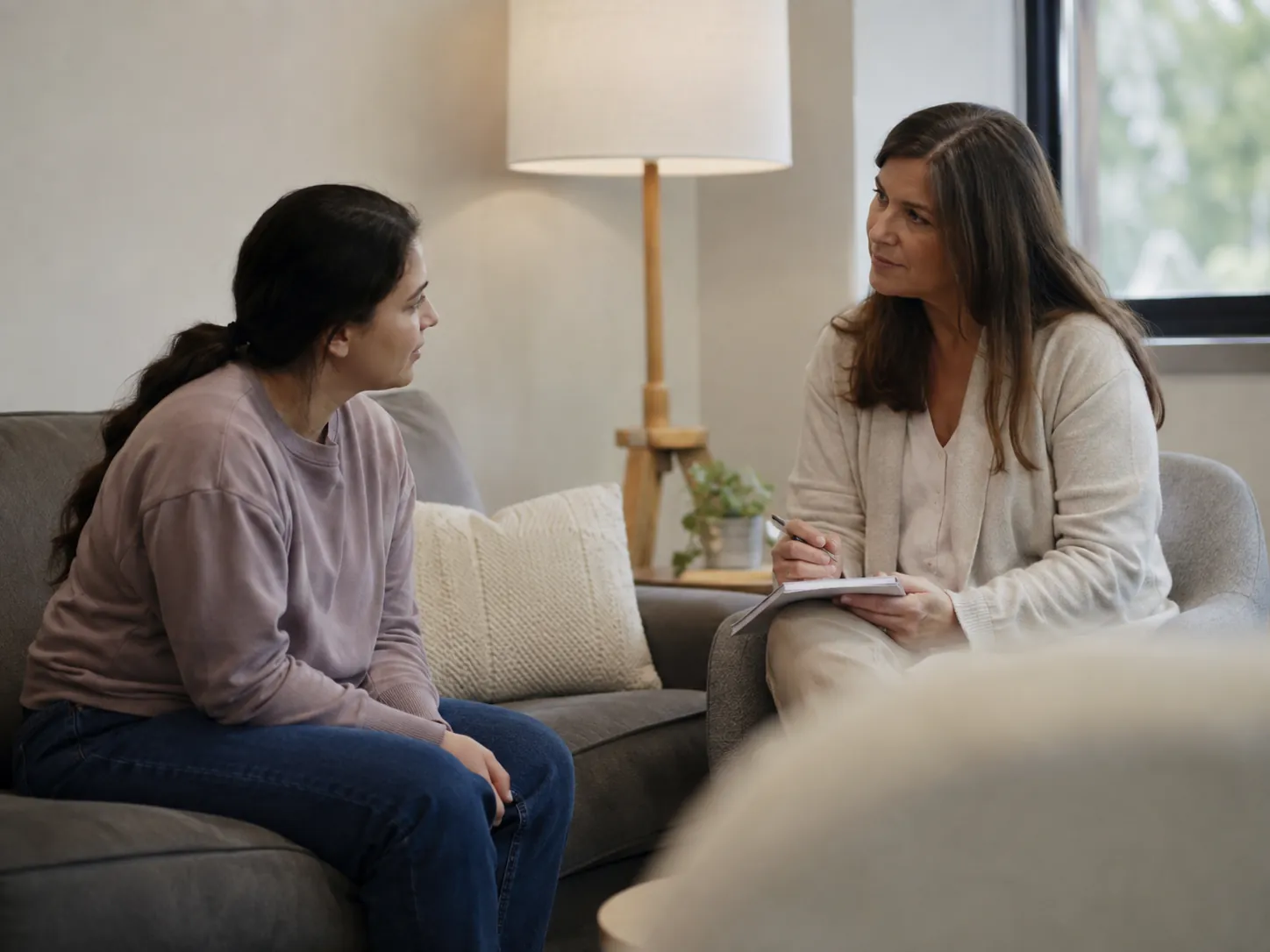 Therapist and client talking in an individual session